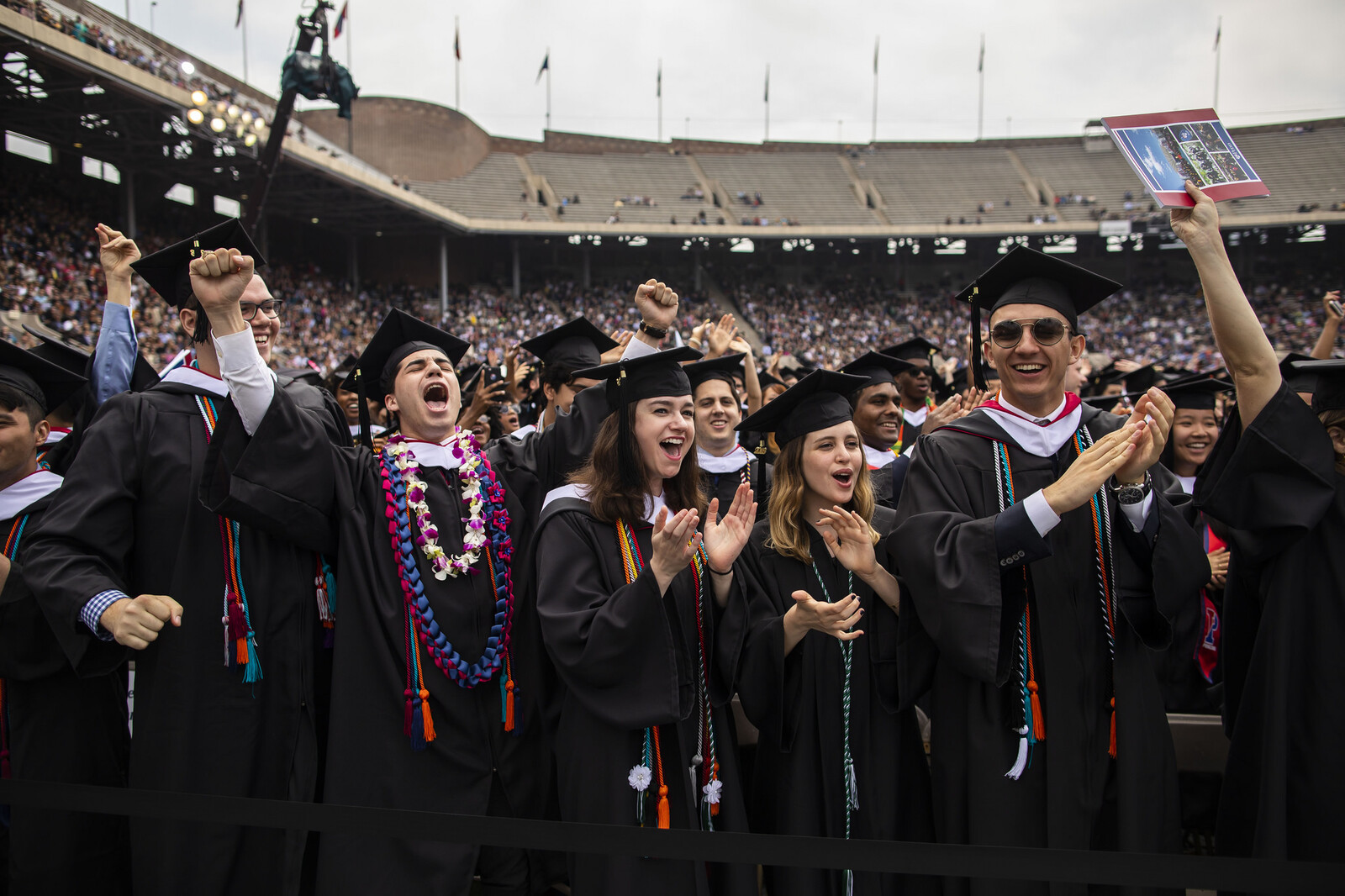 commencement graduates cheering