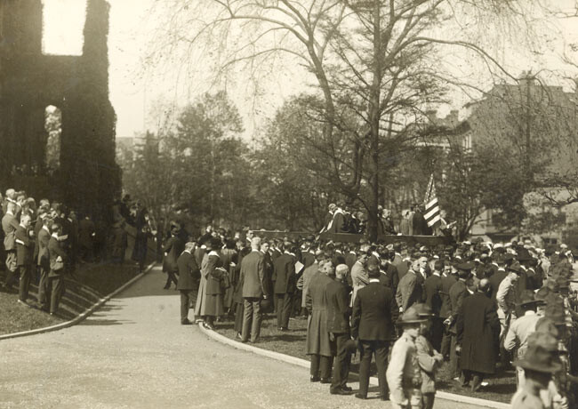 black and white photo of 1918 graduation visitors on campus green