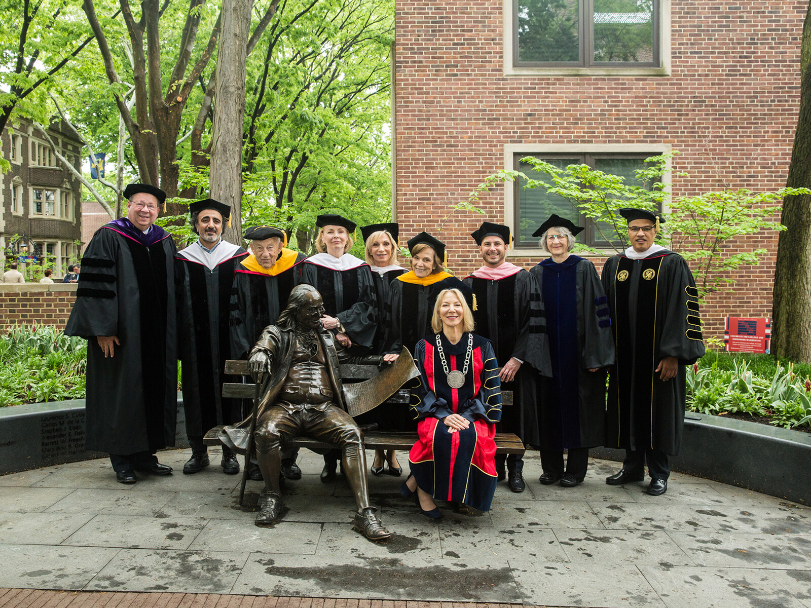 2018 Penn, Amy Gutmann and honorary degree recipients in regalia